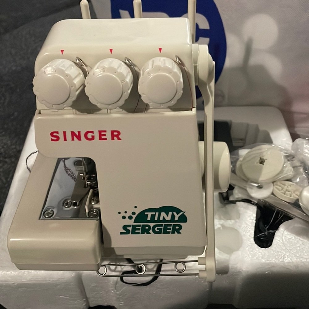 Tiny serger sewing machine